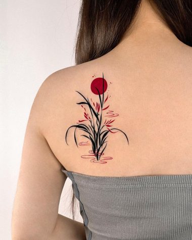 Сочетание орхидеи с другими символами в татуировке